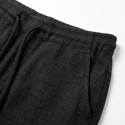 https://cdn.shopify.com/s/files/1/0972/9848/1492/files/Reuben-Pantalones-de-Hombre-con-Cordon-y-Pierna-Ancha-3.png?v=1766716773