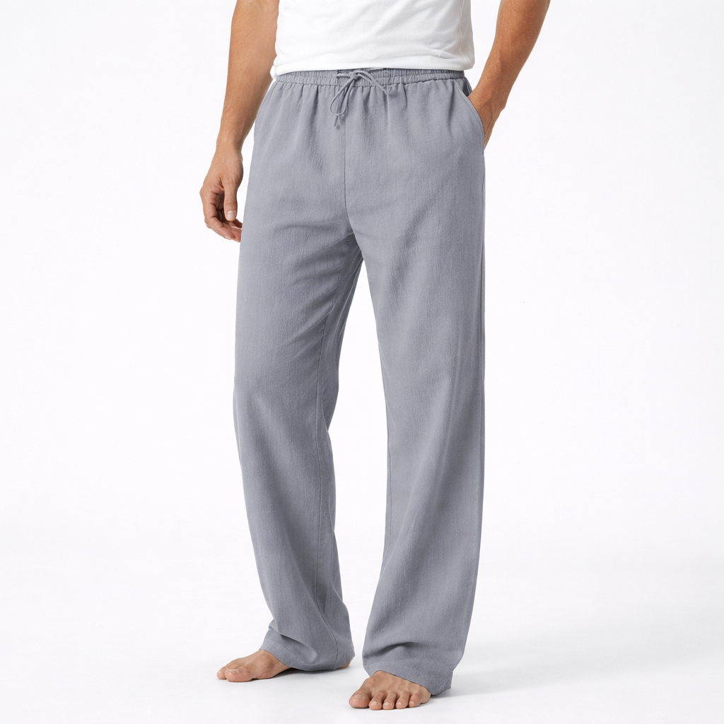 https://cdn.shopify.com/s/files/1/0972/9848/1492/files/Reuben-Pantalones-de-Hombre-con-Cordon-y-Pierna-Ancha-7_19282c21.png?v=1770826388