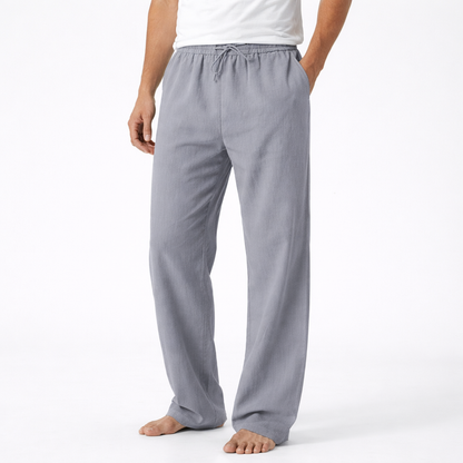 https://cdn.shopify.com/s/files/1/0972/9848/1492/files/Reuben-Pantalones-de-Hombre-con-Cordon-y-Pierna-Ancha-7_19282c21.png?v=1770826388