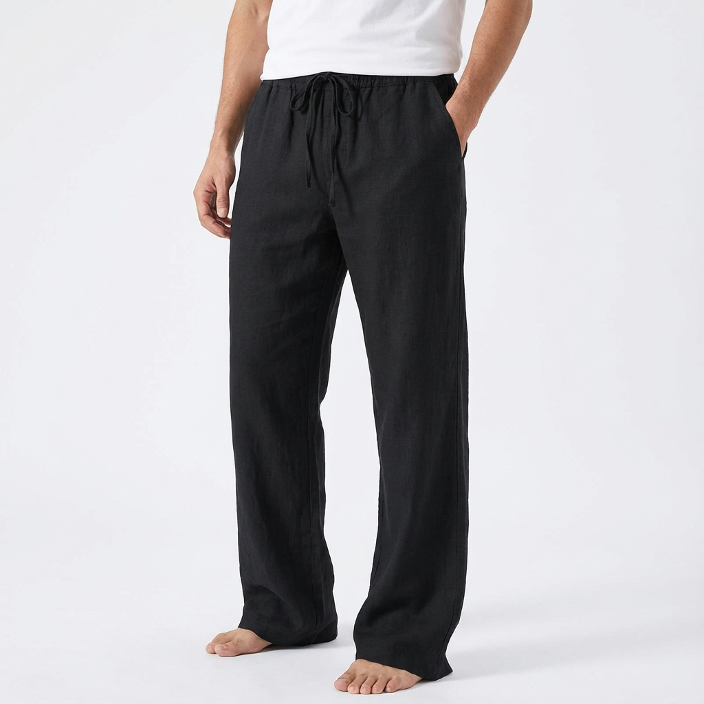 https://cdn.shopify.com/s/files/1/0972/9848/1492/files/Reuben-Pantalones-de-Hombre-con-Cordon-y-Pierna-Ancha.png?v=1766716762