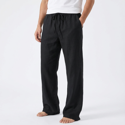 https://cdn.shopify.com/s/files/1/0972/9848/1492/files/Reuben-Pantalones-de-Hombre-con-Cordon-y-Pierna-Ancha.png?v=1766716762